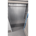 Empty secure 50sqft self storage unit interior